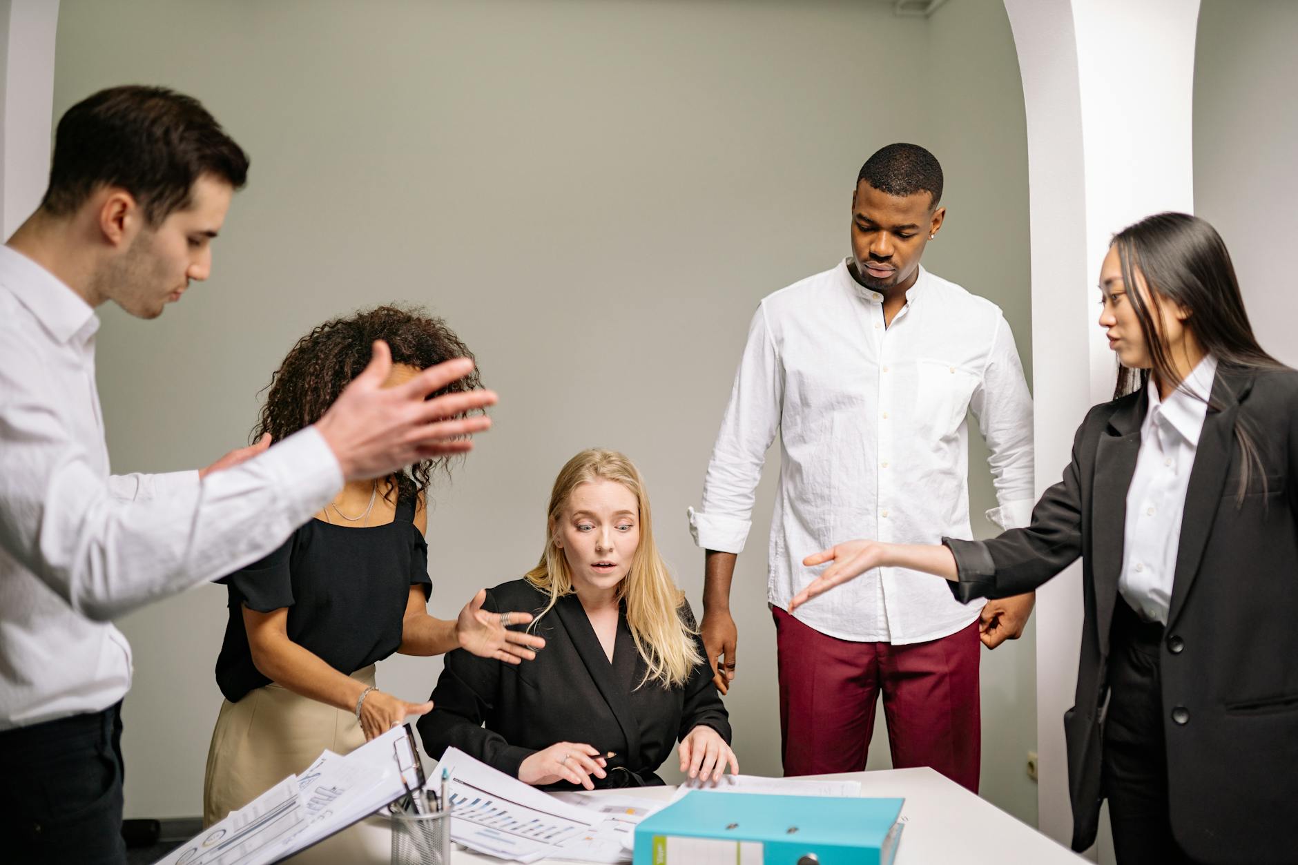 A photo of a debate team preparing, highlighting the psychological aspect of teamwork. — psychology of debating