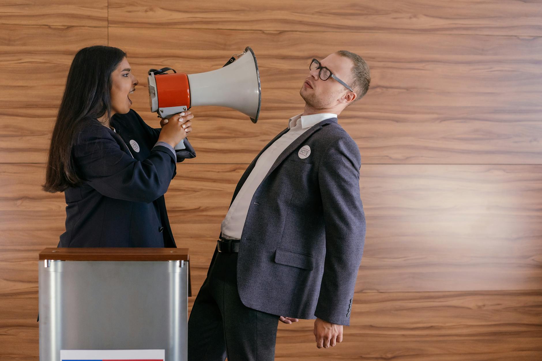 An image of a debate club meeting, with members presenting their arguments in front of an audience. — debate club benefits